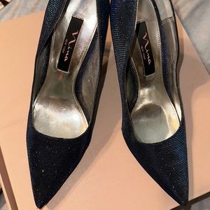Iridescent blue Nina stilettos.   Never worn out of the house  like new